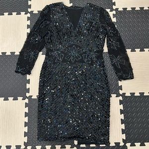 beaded and sequence black dress with lots of detailing